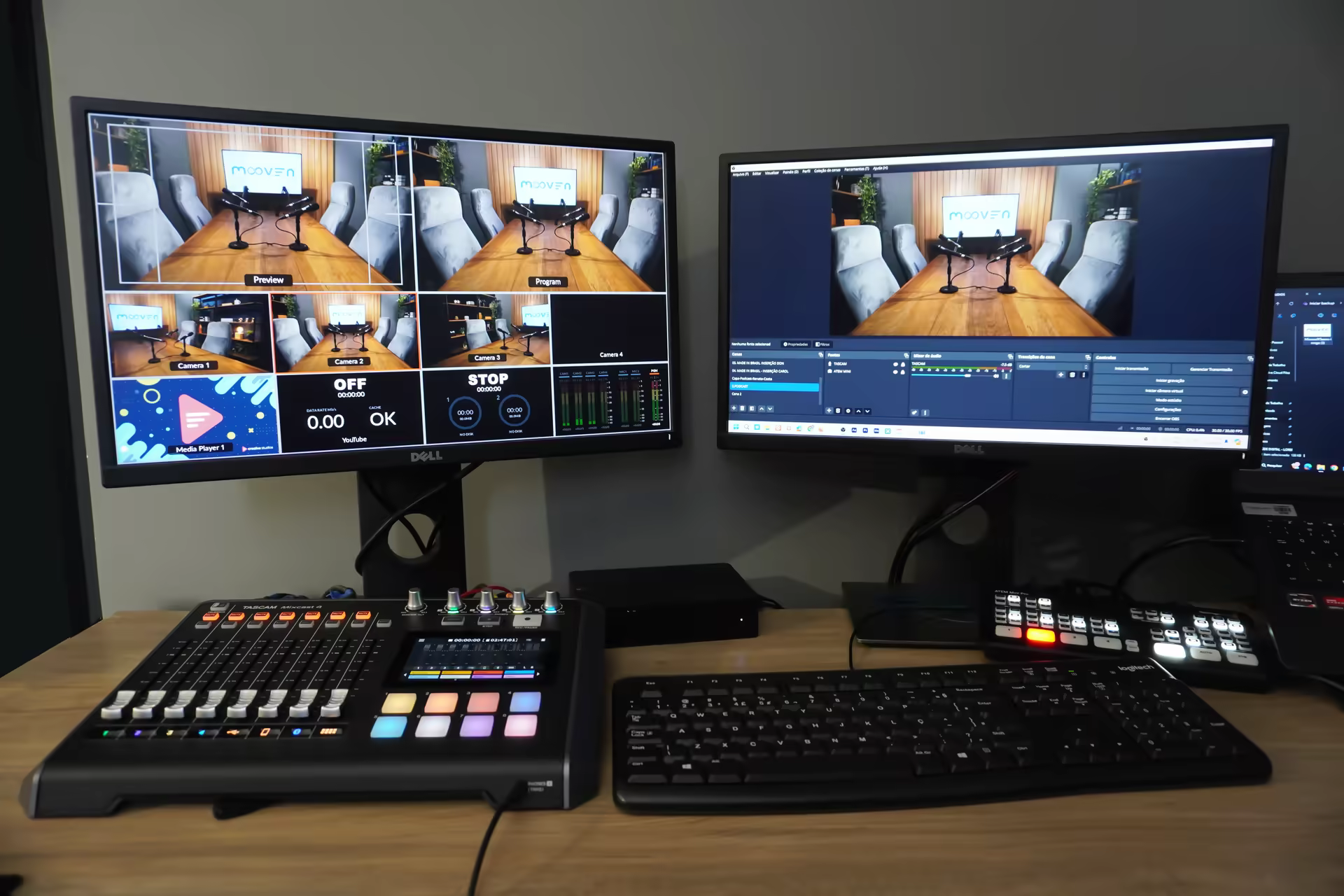 Ilha de operação com mesa de corte, mixer de áudio e monitor multiview
